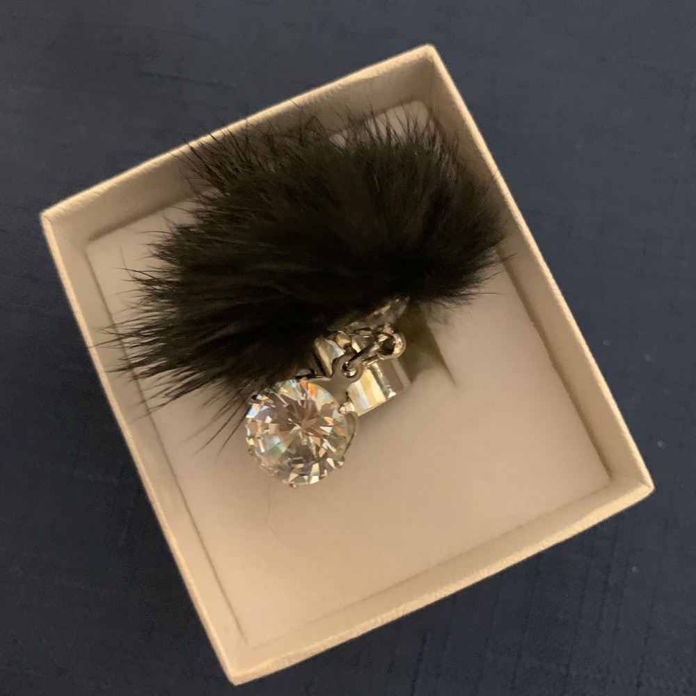 2/$13 Silver tone ring with shiny stone and black fur